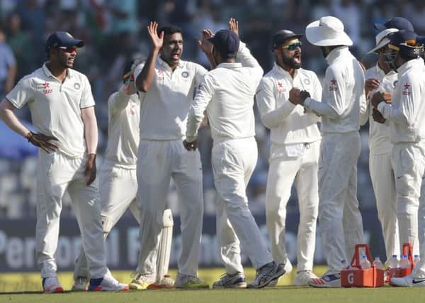 India celebrate the wicket of Jonny Bairstow on the final day. (Pictures: AP Photo/Rafiq Maqbool)