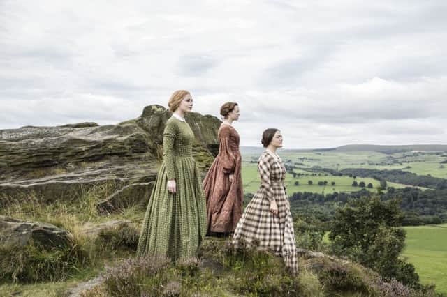 Finn Atkins as Charlotte;  Charlie Murphy and Chloe Pirrie as Anne and Emily. The cast filmed on the Yorkshire moors in suitably wuthering weather.