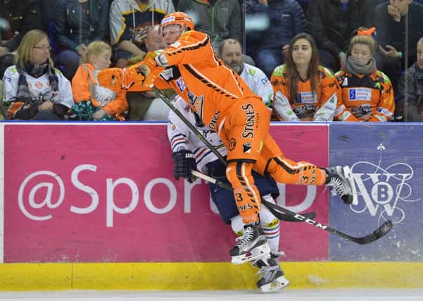 Sheffield Steelers' Davey Phillips gets up close and pysical against Dundee Stars. Picture: Dean Woolley.