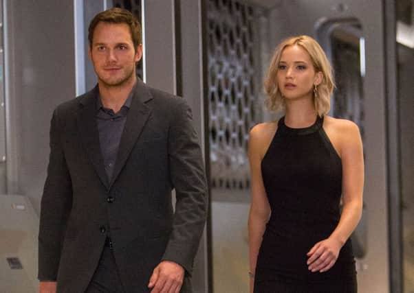 Undated Film Still Handout from Passengers. Pictured: Chris Pratt as Jim Preston and Jennifer Lawrence as Aurora Dunn. See PA Feature FILM Pratt Lawrence. Picture credit should read: PA Photo/Sony. WARNING: This picture must only be used to accompany PA Feature FILM Pratt Lawrence.