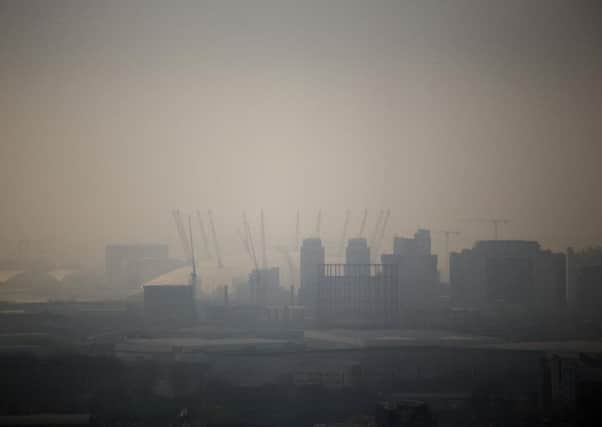 London's Millennium Dome shrouded in smog
