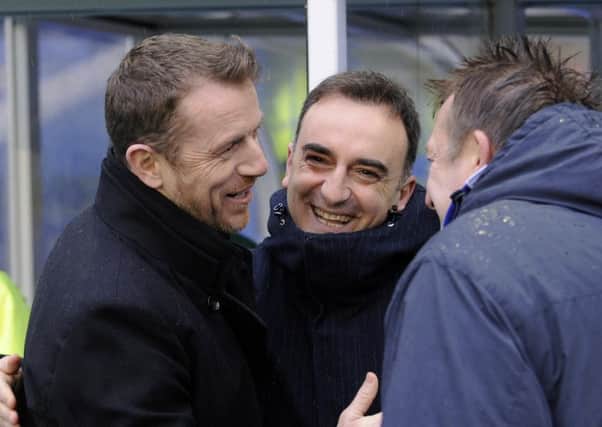 Sheffield Wednesday head coach Carlos Carvalhal shares a joke with Gary Rowett, who has since been sacked as Birmingham City's manager.