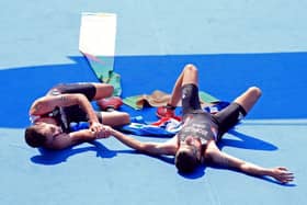 Great Britain's Alistair Brownlee (left) and brother Jonny embrace after winning Gold and Silver in the Men's Triathlon at Fort Copacabana (Picture: Mike Egerton/PA Wire)