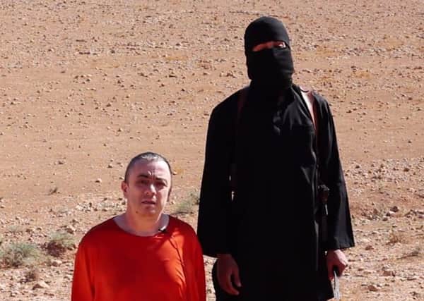 Footage allegedly showing the moments before the beheading of British hostage Alan Henning, who was kidnapped by IS militants.