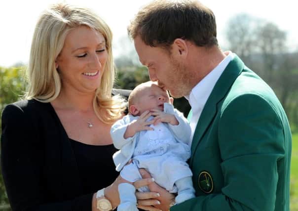Zachariah arrived just in time to allow father Danny Willett, seen with wife Nicole, to compete  and win  the Masters (Picture: PA).