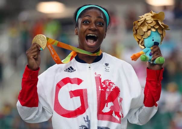 GREAT YEAR: Kadeena Cox celebrates winning the women's C4/C5 500 metres time-trial at the Rio Paralympics. Picture: Andrew Matthews/PA.
