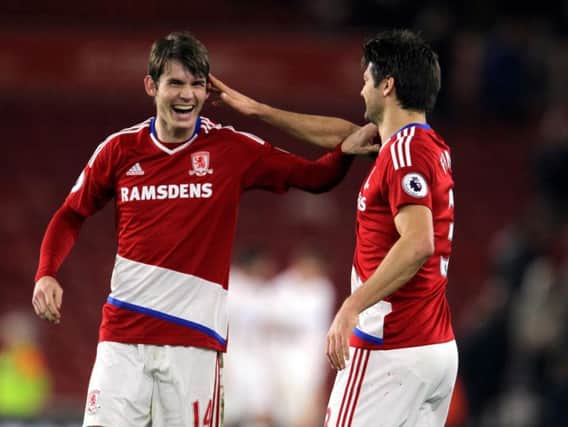Middlesbrough's Marten de Roon (left) and George Friend celebrate after the match (Photo: PA)