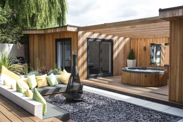 An uninspiring back garden has been transformed into an outdoor living space and extra room.