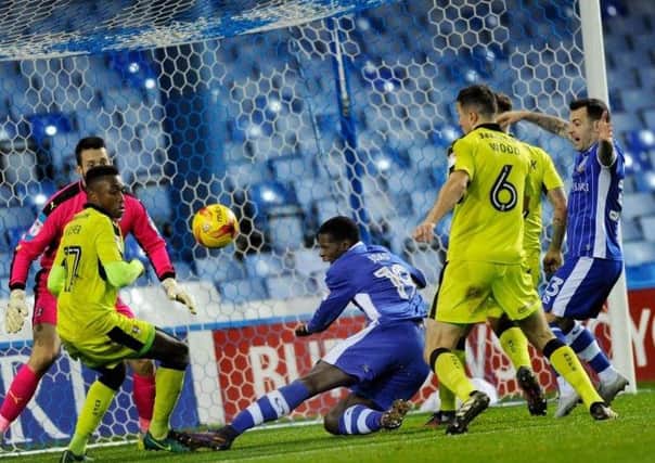 Lucas Joao is brought down by Richard Wood for the late penalty that enabled Sheffield Wednesday to beat Rotherham United (Picture: Steve Ellis).