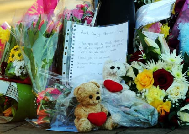 Flowers at the scene of three murders on Beeston Way in Allerton Bywater, near Castleford.
2nd Febuary 2016.
Picture : Jonathan Gawthorpe
