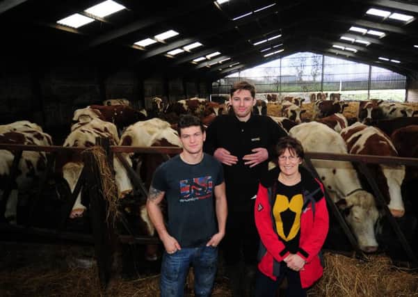 The Dearnley family of Bark House Dairy Farm, Shelley. Pictured from the right are Janet Cartwright, Nathan Dearnley and James Cartwright.  Pictures: Simon Hulme