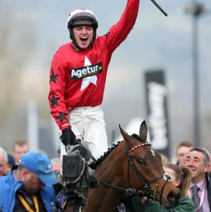 Jockey Ryan Hatch celebrates after a winning ride on Blaklion in the RSA Chase during Ladies Day of the 2016 Cheltenham Festival. Picture: David Davies/PA
