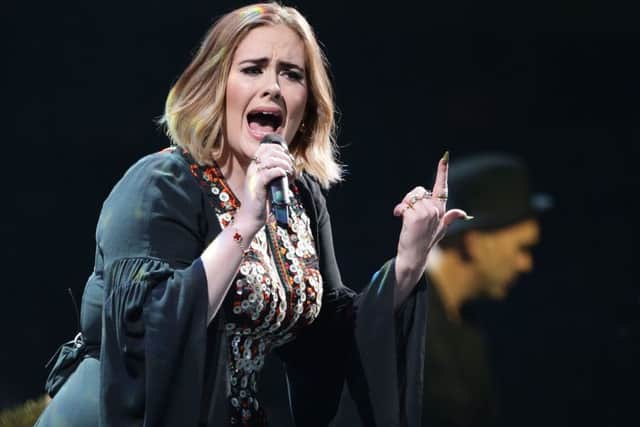 Adele performing at Glastonbury, in June
