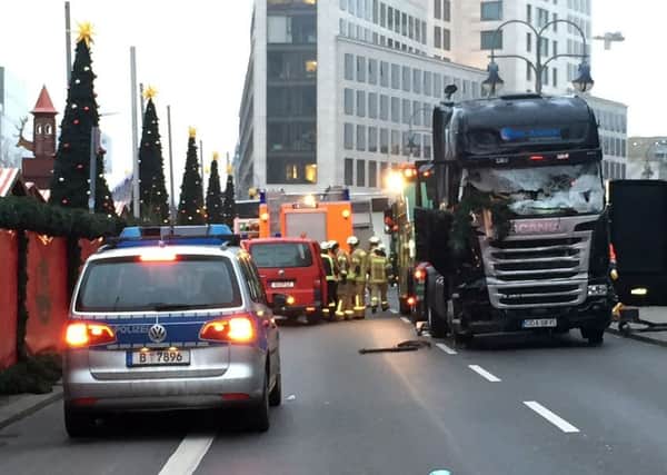 The scene at the Christmas market in Berlin where a truck ploughed into revellers.