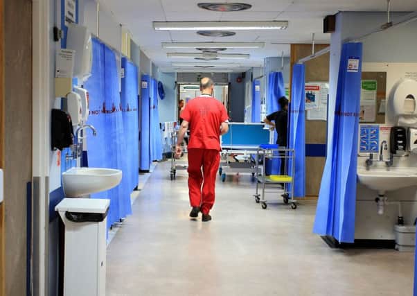 File photo dated 03/10/14 of a hospital ward, as hospital admissions across the NHS in England rose to record levels last year. PRESS ASSOCIATION Photo. Issue date: Wednesday November 9, 2016. Figures from NHS Digital show there were 16.2 million admissions during 2015/16, up from 12.7 million a decade ago. See PA story HEALTH Hospitals. Photo credit should read: Peter Byrne/PA Wire