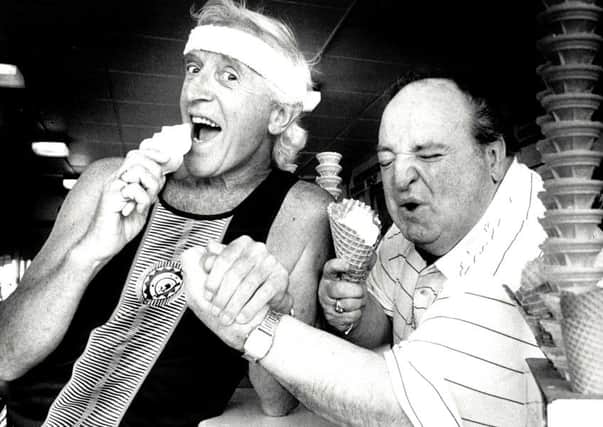 Picture shows Sir Jimmy Savile in May 1991 with good friend Peter Jaconelli.