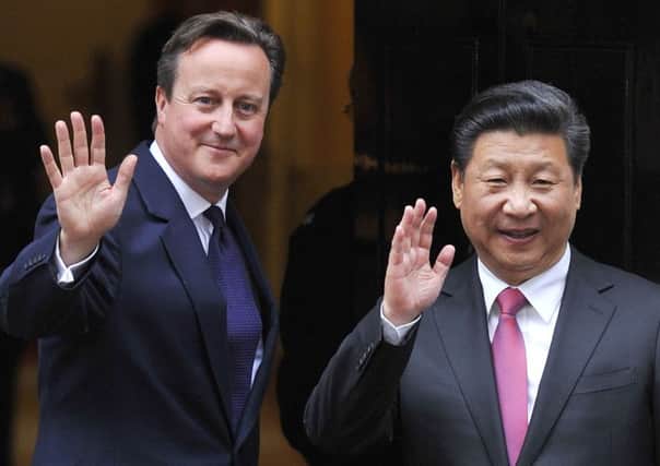 Former UK Prime Minister David Cameron with the President of China, Xi Jinping, in October last year.