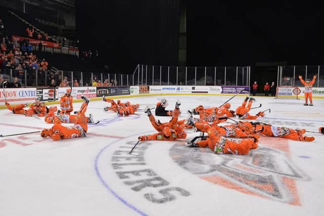 Sheffield Steelers' all celebrate the now traditional post-match 'Eddy'. Picture Dean Woolley.