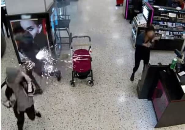 The moment an e-cigarette battery exploded in the user's pocket  at the Trinity shopping centre in Leeds.