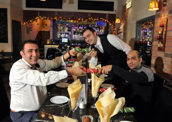 21 December 2016.......     Mo Rastegar, the owner of Zio in Horsforth, along with chef Mo Zanoubi and waiter Mario Costin opening the restaurant up on Christmas day and offering free, food, wine and presents for the homeless or people without any family to spend the day with.  Picture Tony Johnson.