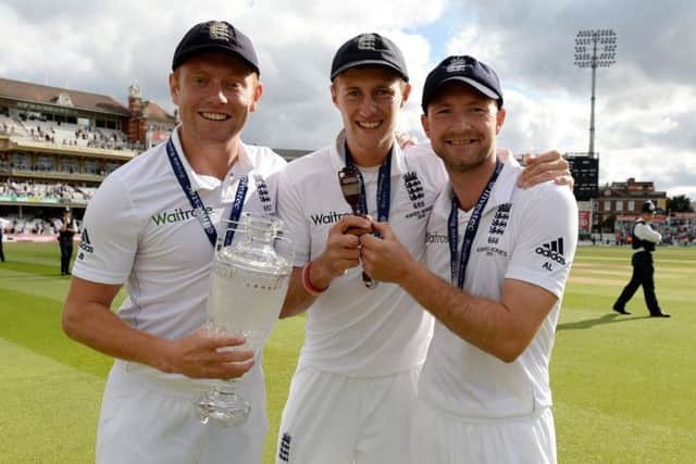 WINNERS: Jonny Bairstow and Joe Root celebrate winning the Ashes in 2015 with Yorkshire team-mate, Adam Lyth.