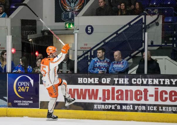 Mathieu Roy celebrates his goal at Coventry on Thursday night. Picture courtesy of Scott Wiggins/EIHL.