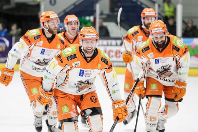HAPPY DAYS: Sheffield Steelers' players celebrate going 1-0 up at Coventry on Thursday night. Picture courtesy of Scott Wiggins/EIHL.