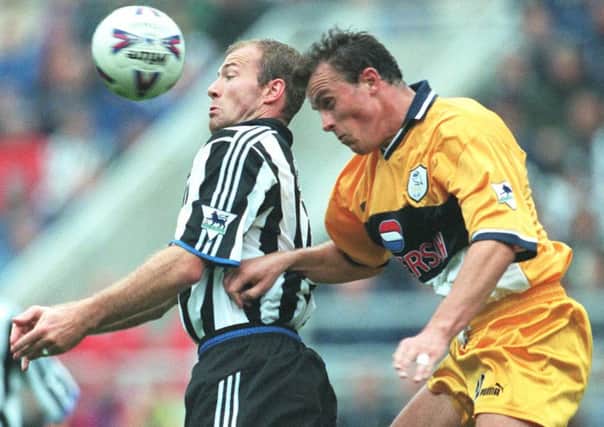 Sheffield Wednesdays Jon Newsome challenges Alan Shearer in a game in September 1999 in which the England forward scored five times as Newcastle won 8-0 (Picture: Steve Ellis).