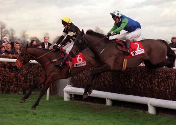 GREAT DAY: See More Business and Andrew Thornton (6) take the last fence on their way to beating Challenger Du Luc and Tony McCoy before winning the King George VI Chase at Kempton in 1997. Picture: Tony Harris/PA.