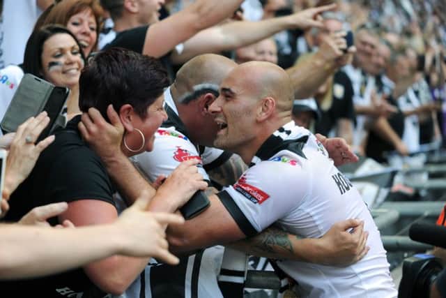 Hull's Danny Houghton celebrates with the fans.
