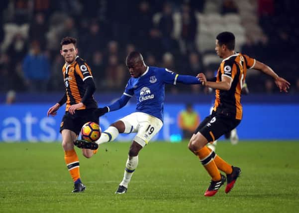Everton's Enner Valencia is challenged by Hull City's Andrew Robertson (left) and Curtis Davies. Picture: Danny Lawson/PA