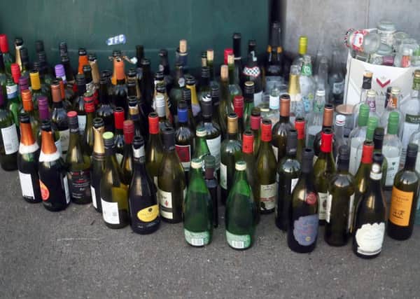Bottles left at a recycling bank, as the NHS is being transformed into the "national hangover service" as binge drinking diverts vital resources, the head of the health service in England said. Credit: Steve Parsons/PA Wire