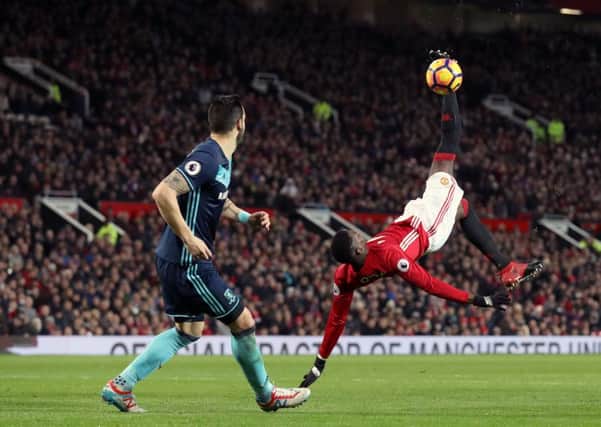 Manchester United's Paul Pogba, who later scored the match-winner against Middlesbrough, struck a post with this acrobatic scissor kick  (Picture: Martin Rickett/PA Wire).