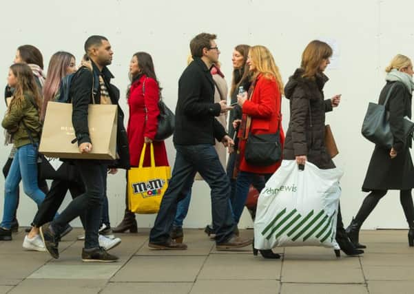 Retailers were hit by a drastic drop in the number of bargain-hunting shoppers passing through their doors on New Year's Day