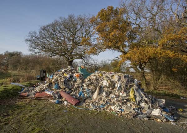 A huge pile of fly-tipped rubbish at a beauty spot in Theydon Bois, Essex