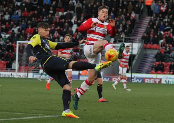 Action from Doncaster's win over Stevenage (Picture: Simon Hall)