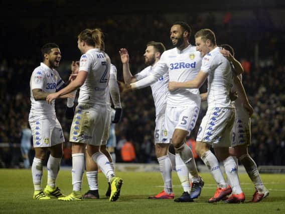 The Leeds squad celebrate Kyle Bartley's opening goal