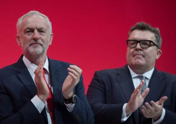 Tom Watson (right) has shed new light on his relationship with Labour leader Jeremy Corbyn