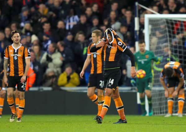 DOWN BT NOT QUITE OUT: Who will be in charge of Hull City's suffering players next? Picture: PA.