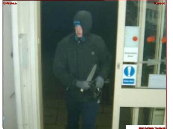 A CCTV image of the armed robber