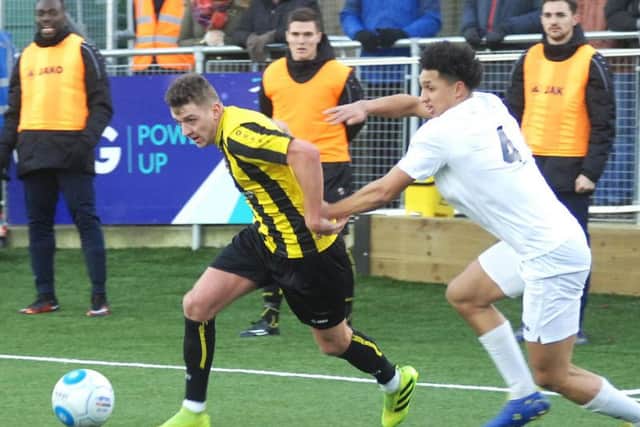 Harrogate Town's Joe Leesley in action against Stockport County on the 3G at the CNG Stadium on December 28