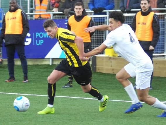 Harrogate Town's Joe Leesley in action against Stockport County on the 3G at the CNG Stadium on December 28