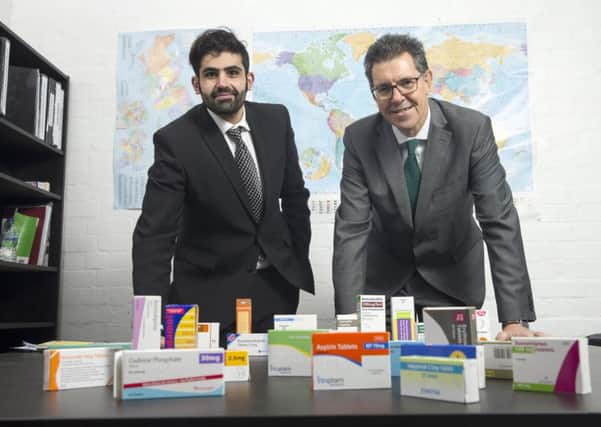 FIRST DELIVERY: CurePharma director, Mustafa Al-Shalechy (left) with Chamber International senior export adviser, David Attia, and samples of the medicines the company has exported in its first delivery to Iraq.
