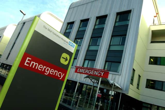 Pinderfields Hospital Emergency entrance. Mid-Yorkshire Hospitals Trust says its contract with EY helped bring stability to its finances.