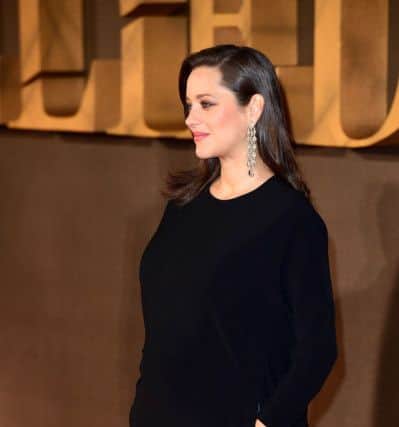 Marion Cotillard - Possibly the most stylish woman of the year on the international red carpets, the pregnant French actress chose to wear this incredible Stella McCartney tunic dress with train for the premiere of Allied in London last month. Sleek no-fuss hair, impeccable make-up - and pockets. Swoon. Ian West/PA Wire.