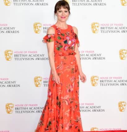 Helen McCrory  - The Peaky Blinders actress has become a red carpet must-watch, thanks to her bold and chameleon-like approach to fashion, choosing styles ranging from sleek and gamine to romantic and feminine as with this floaty Andrew Gn gown, worn at the BAFTA TV Awards back in May. Ian West/PA Wire