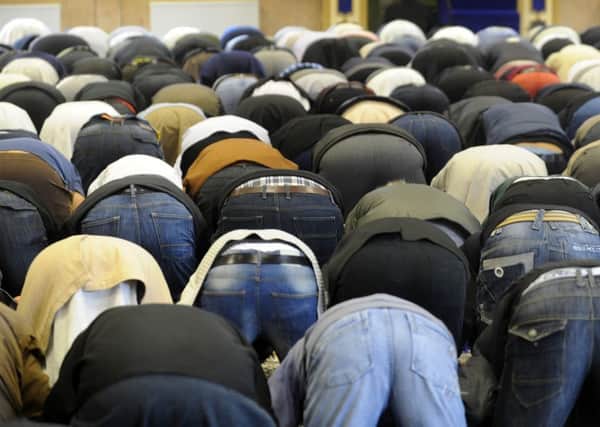 Friday prayers at a Leeds mosque - are Muslims doing enough to integrate into society?