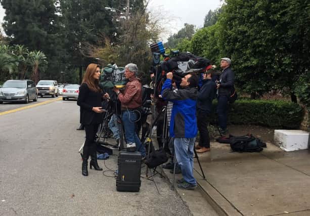 Media gather outside a star-studded memorial service held at Carrie Fisher's home in Los Angeles