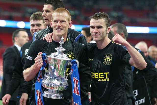 Sheffield Wednesdays Callum McManaman celebrates with Ben Watson after Wigans shock FA Cup final triumph at Wembley in 2013.