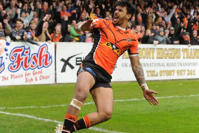Denny Solomona celebrates after scoring one of 42 tries he amassed for Castleford in 2016.